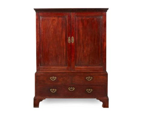 of neat size, the dentil moulded cornice above a pair of chamfer panel doors enclosing two sliding trays; the lower part with