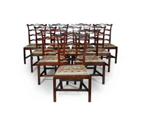 with pierced ladder backs above drop-in needlework seats raised on square straight legs joined by stretchers55cm wide, 95cm h