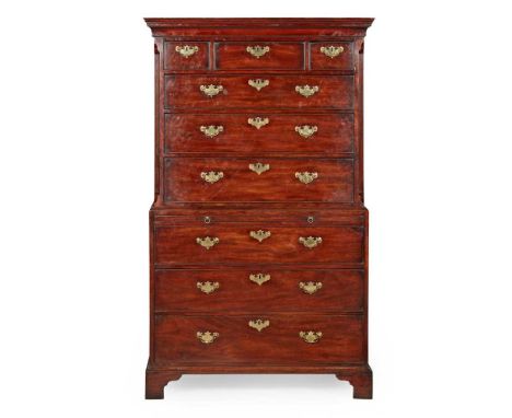 the moulded cornice above three short drawers and three long drawers; the lower part with a brushing slide and three further 