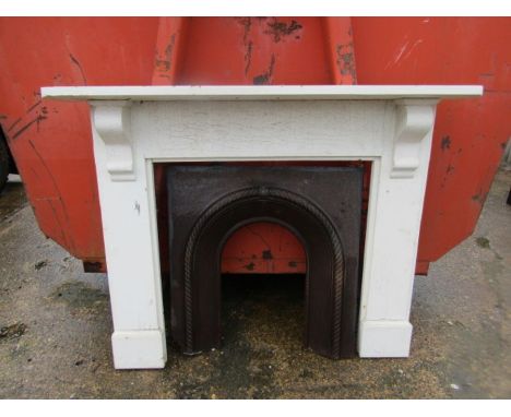 Cast iron fireplace with wooden surroundInside fire surround 80wx84cmOutside surround 120cmw x104HAnd135cm top shelf