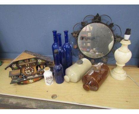 Stoneware foot warmers, onyx lamp, mirror and Cuckoo clock etc&nbsp;