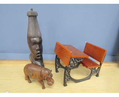 African carved lamp base, treen hippo and small desk with cast iron legs