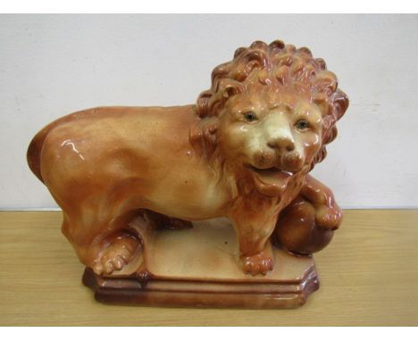 A large Staffordshire ceramic lion 37x30cm