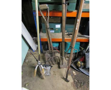quantity of garden tools inc fruit picker,long arm pruner, post hole digger, compactor, 2 junior forks, hedge trimmer etc