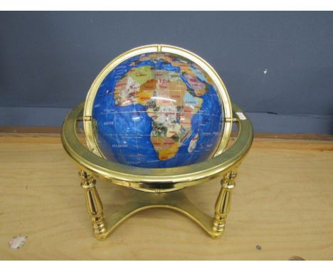 Gem stone Terrestrial Globe set with semi precious stones in a brass stand with compass below