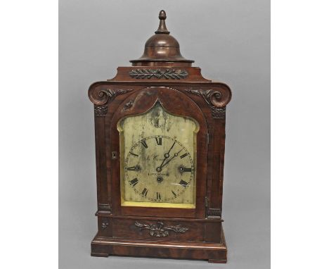 AN EARLY VICTORIAN BRACKET CLOCK BY CUNLIFF OF LIVERPOOL, the silvered arch-topped dial with strike/silent indicator above a 