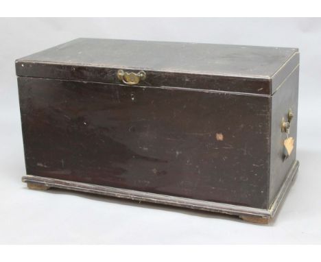 MAHOGANY TRUNK, possibly George II, the hinged cover enclosing a vacant interior, with brass swing handles, height 65cm, widt