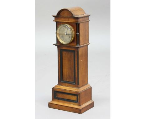 Miniature Longcase Clock with Key MINIATURE MAHOGANY LONGCASE CLOCK, the 3 1/4" silvered dial on a brass, eight day movement 