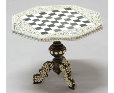 ANGLO-INDIAN VISAKHAPATNAM STYLE MINIATURE CHESS TABLE, 19th century, of octagonal form on a turned column and tripod base, i