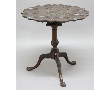 GEORGE III STYLE MAHOGANY SUPPER TABLE, the carved top with nine circular dishes on a birdcage tilt top movement, turned colu