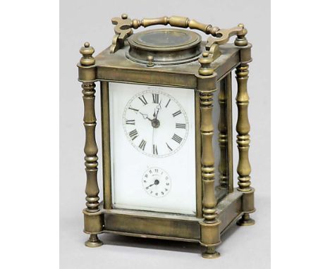 BRASS FOUR PANE CARRIAGE CLOCK the enamelled dial with centre sweep seconds hand, subsidiary alarm dial on an eight day movem