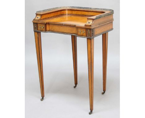 SATINWOOD CARLTON HOUSE STYLE LADIES WRITING DESK, the brass, three quarter gallery above a superstructure with two drawers, 