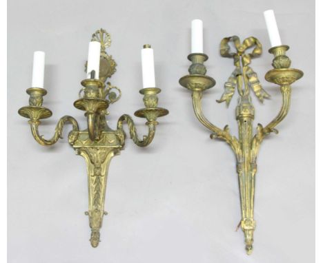 GILT METAL THREE BRANCH WALL LIGHT, cast with an anthemium above an oval frame, neo-classical scrolls and harebell swags, hei