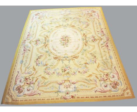 LARGE AUBUSSON STYLE TAPESTRY, 19th century, a central floral cartouche inside floral and ribbon swags, 380cm x 270cm approx