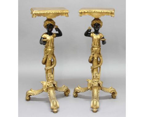 PAIR OF GILTWOOD AND PAINTED BLACKAMOOR STANDS, 19th century, possibly Venetian, the figures holding bowls and grapes on twis