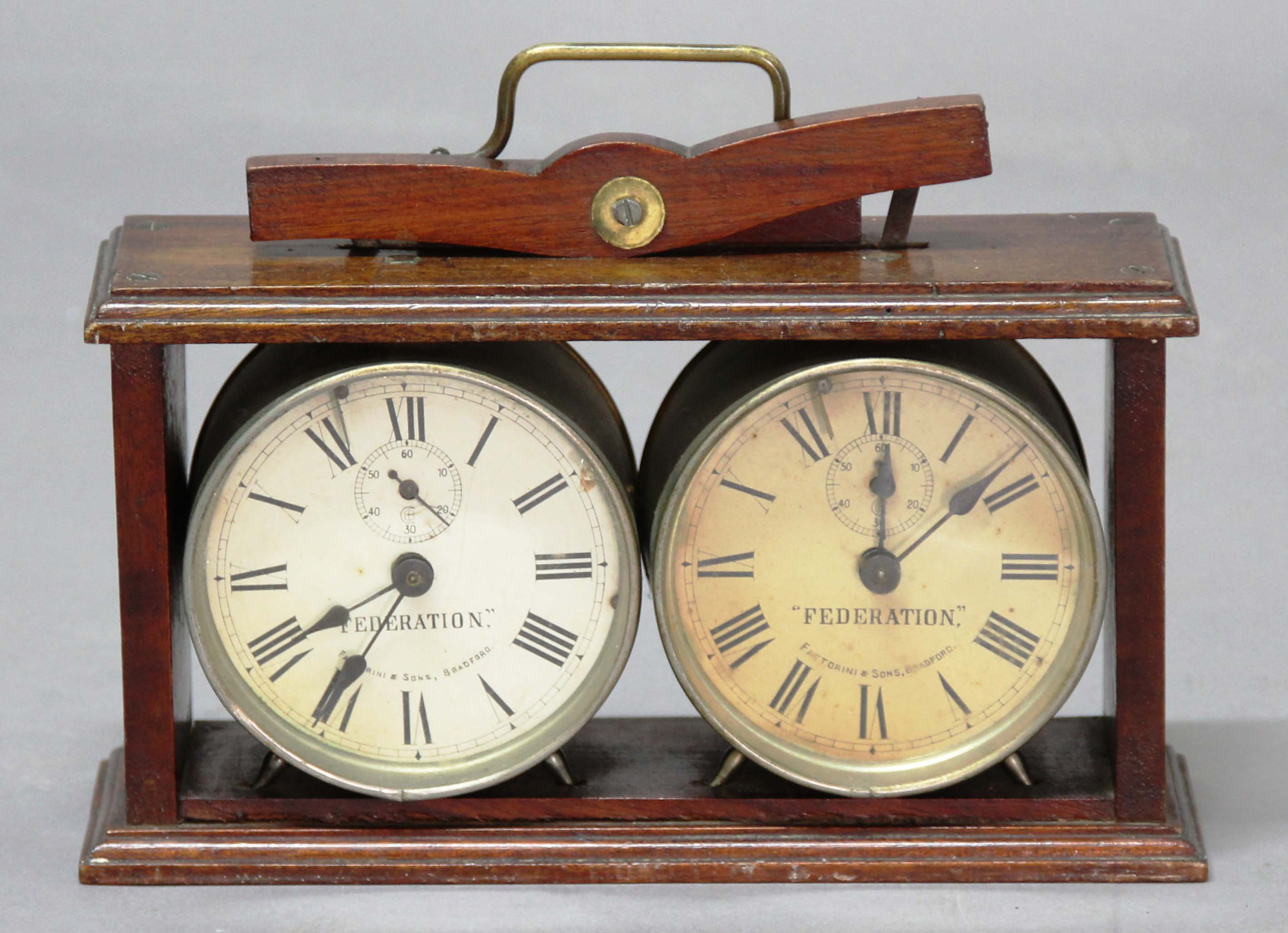 FEDERATION CHESS CLOCK, by Fattorini and Sons, Bradford, in a mahogany