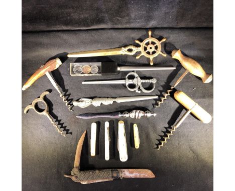 Four mother of pearl mounted knives, including one fitted with button hook and awl; four various corkscrews; a wooden tobacco