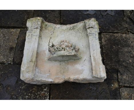 A medieval limestone Gothic church fragment, 14th or 15th century. The base of a niche, which was often found above above, or