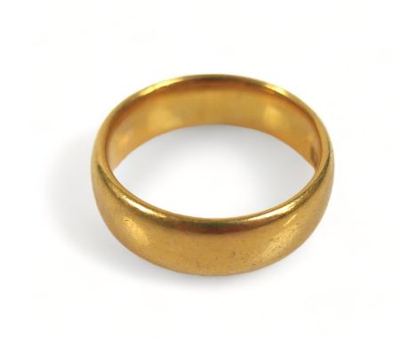 A 22ct gold band, size M, 8g. 