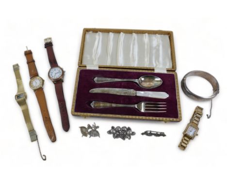 A group of silver and jewellery, comprising a silver three piece Christening set, cased, a silver hinged bangle, a silver bro