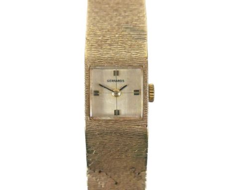 A vintage Gerrards 9ct gold lady's wristwatch, square gold dial, black and gold batons and hands, seventeen jewels movement, 