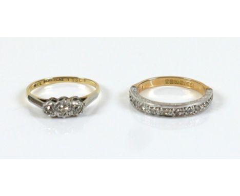 Two diamond and white gold / platinum rings, one a half-eternity ring set with small diamonds, the lower half gold hallmarked