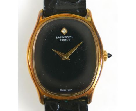 A Raymond Weil Geneve Swiss made wristwatch, with black dial inlaid with a single white stone, with a Rotary watch hardcase.W