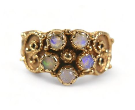 A 14ct yellow gold opal ring size M, 3.9 grams. 