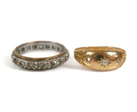 An 18ct yellow gold gypsy ring, set with two (missing one) small diamonds, largest 2.5mm, size O/P, 2.1g, together with a 9ct