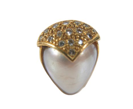 An 18ct gold ring set with large pear-shaped pearl, approximately 12 by 15mm, sixteen small diamonds, size N, 7.6g. 