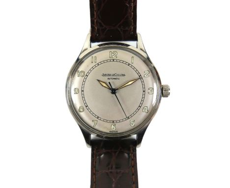 A vintage Jaeger LeCoultre stainless steel cased gentleman's automatic wristwatch, circa 1950s,  with circular champagne dial