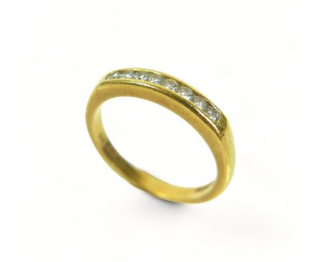 An 18ct yellow gold eight stone diamond ring, size L/M, 3.8 grams.Some usage marks but diamonds bright. 