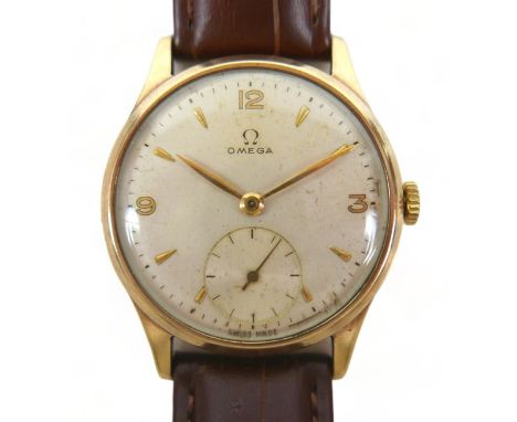 A 9ct yellow gold Omega manual wind gents wristwatch with secondary dial, 33mm case, total weight 36 grams.Replacement winder