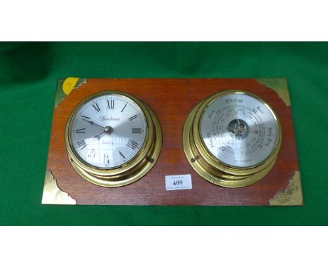 Double steel dial Spectrum Quartz wall clock and barometer both in brass case mounted on rectangular wall plaque