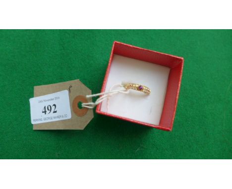 Ruby and diamond gold ring marked .750 (size p)