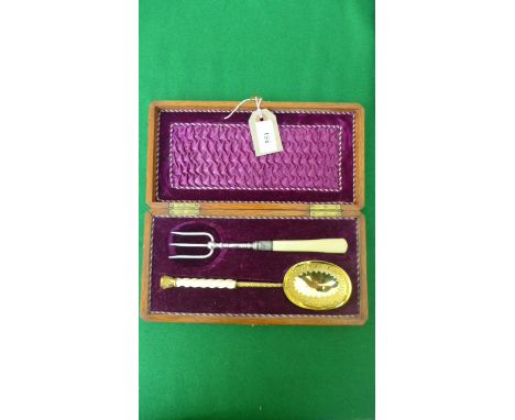 Rectangular canteen box housing bone handled silver gilt spoon (the other  missing) offered with bone handled plated bread fo