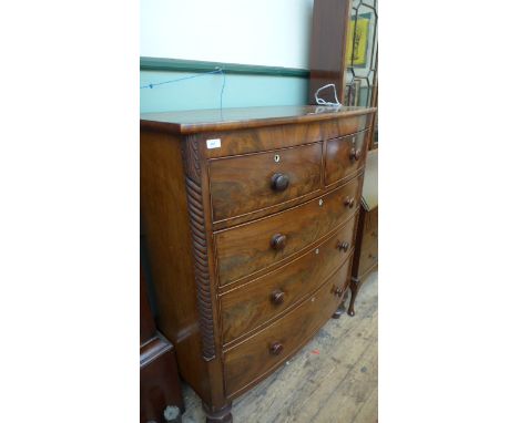 Fine Georgian figured mahogany bow fronted chest of 2 short and 3 long graduated drawers each with circular handles on bobbin