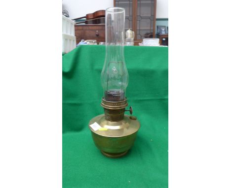 Brass oil lamp with glass flue