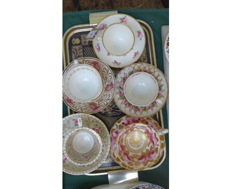 5 principally pink and cerise ground cups and saucers from various factories including early Derby, Coalport, Worcester etc 