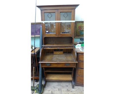 Edwardian mahogany ladies writing desk with folding concertina slide revealing open pigeon holes and storage drawer, the uppe