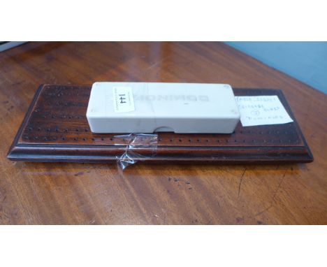 Boxed cribbage board and domino set