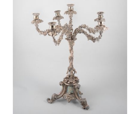 A silver-plated candelabrum, five branch and decorated in grape vines, 60cm high, a ceramic cup with hallmarked silver cover,