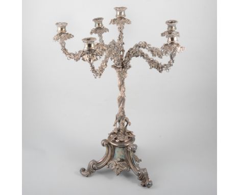 A silver-plated candelabrum, five branch and decorated in grape vines, 60cm high, a ceramic cup with hallmarked silver cover,