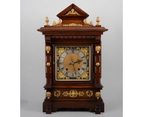 Continental shelf clock, walnut architectural case, square brass dial with a silver chapter ring, RSM movement striking on tw