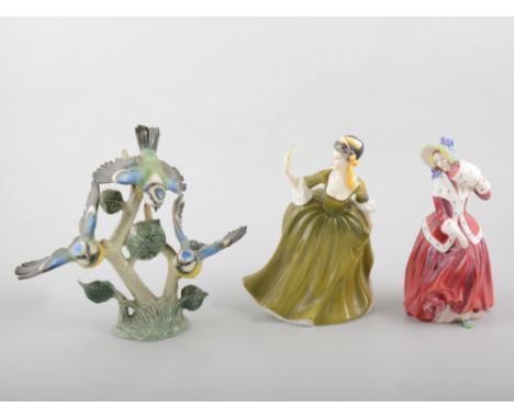 Four Royal Doulton figures, HN1992, HN2378, HN2309, and HN2473, together with a Goebel group of three Blue Tits, 1966, (5)