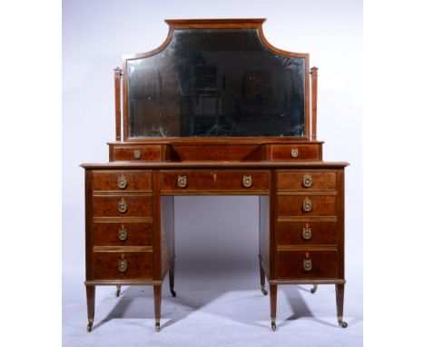 Victorian mahogany dressing table, shaped bevelled mirror above trinket drawers, the base with a rectangular top and moulded 