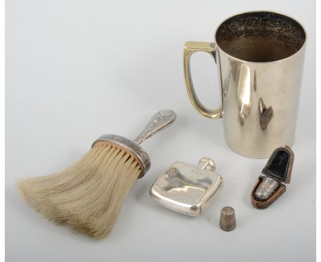 Small Victorian silver flask, Birmingham 1899, engraved, 7cm; silver -handled crumb brush; plated mug and two thimbles.