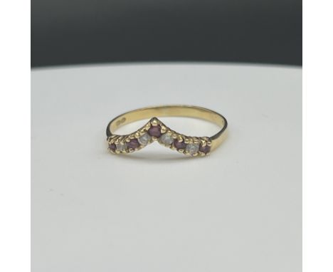 9ct yellow gold ruby and diamond wishbone eternity ring,
size Q,