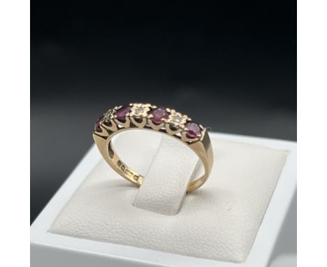 A 9ct yellow gold ruby and diamond ring, 
size L, 
2 grams