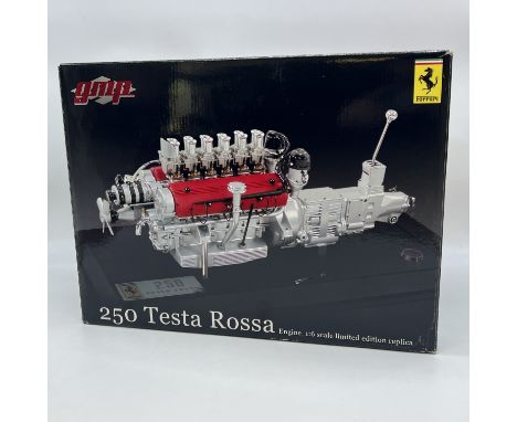 A 250 Testa Rossa Ferrari model engine
comes with a stand and display case